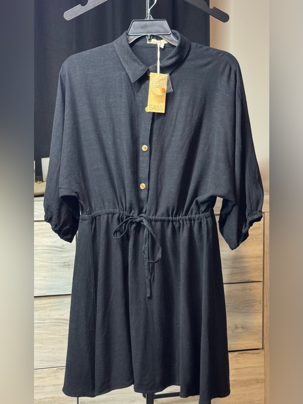 SASS Black Button-Front Drawstring Mini Dress with loose elastic sleeves.